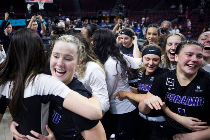 The Portland Pilots celebrate after winning the West Coast Conference championship against the ...