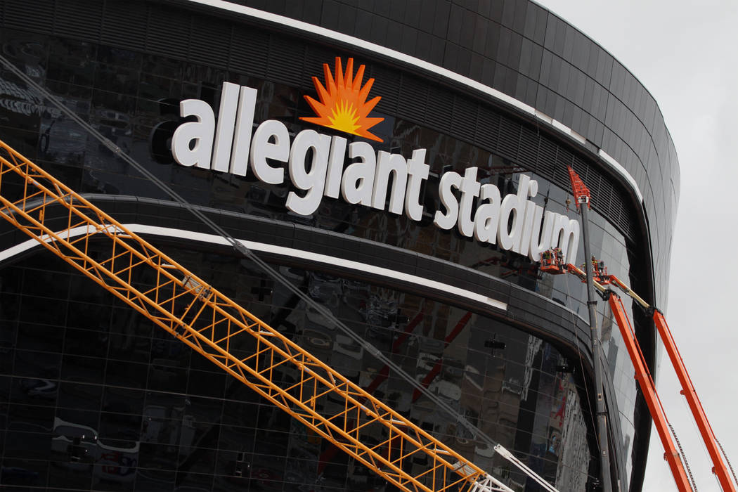 Signage is installed at the Raiders Allegiant Stadium in Las Vegas, Tuesday, March 10, 2020. (E ...