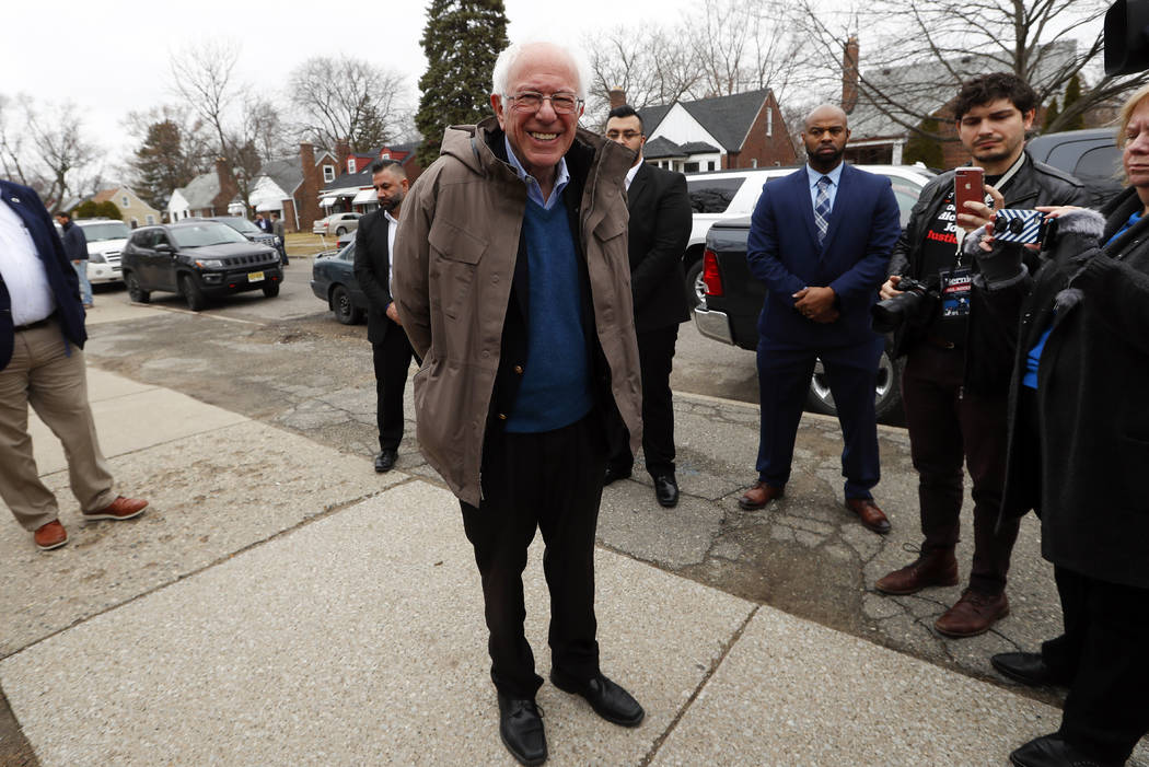 Democratic presidential candidate Sen. Bernie Sanders, I-Vt., visits outside a polling location ...