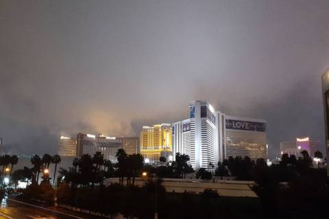Clouds shroud The Mirage and other resorts on the Las Vegas Strip about 2:45 a.m. Wednesday, Ma ...
