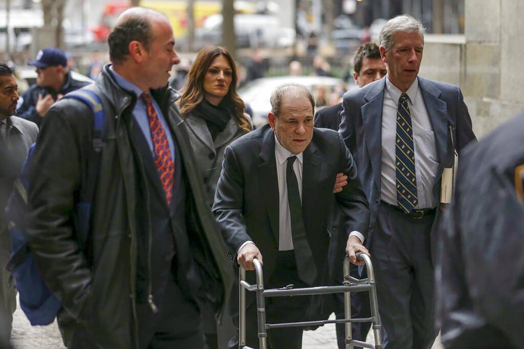 Harvey Weinstein, center, arrives at New York court, Monday, Jan. 6, 2020, in New York. The dis ...