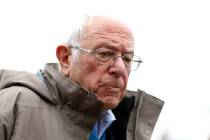 Democratic presidential candidate Sen. Bernie Sanders, I-Vt., visits outside a polling location ...
