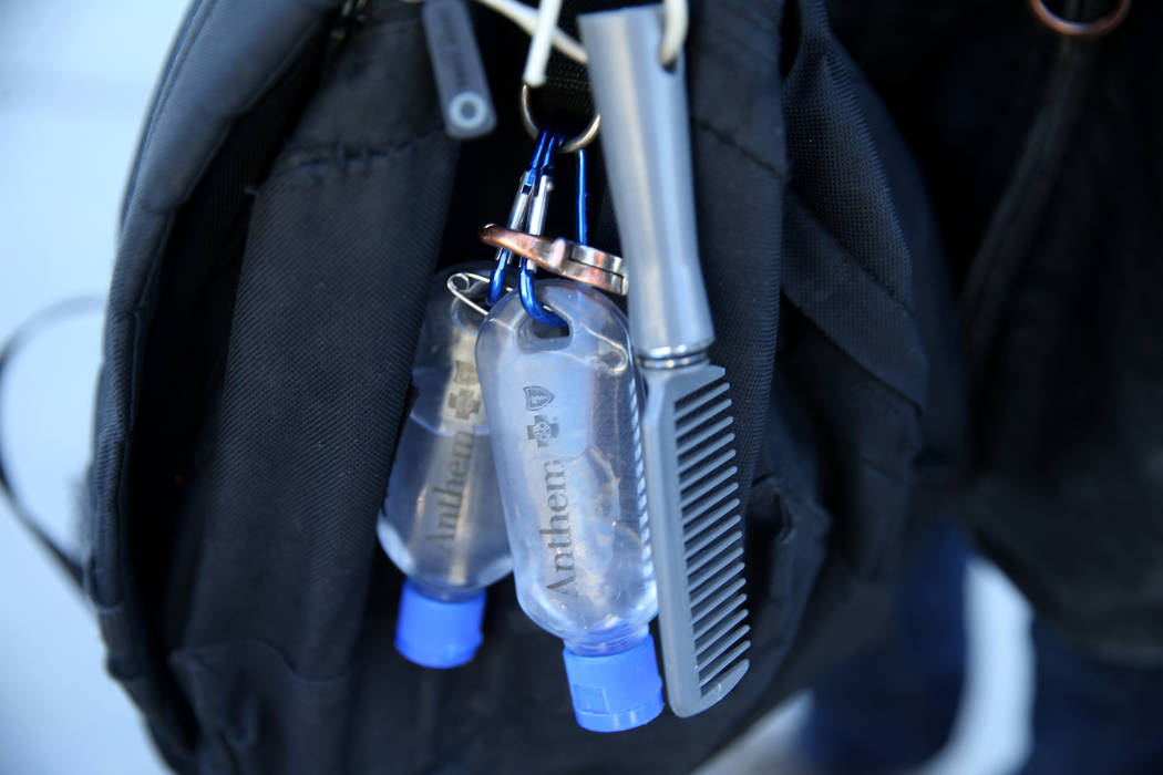 Bottles of hand sanitizer on a backpack at The Courtyard Homeless Resource Center in downtown L ...