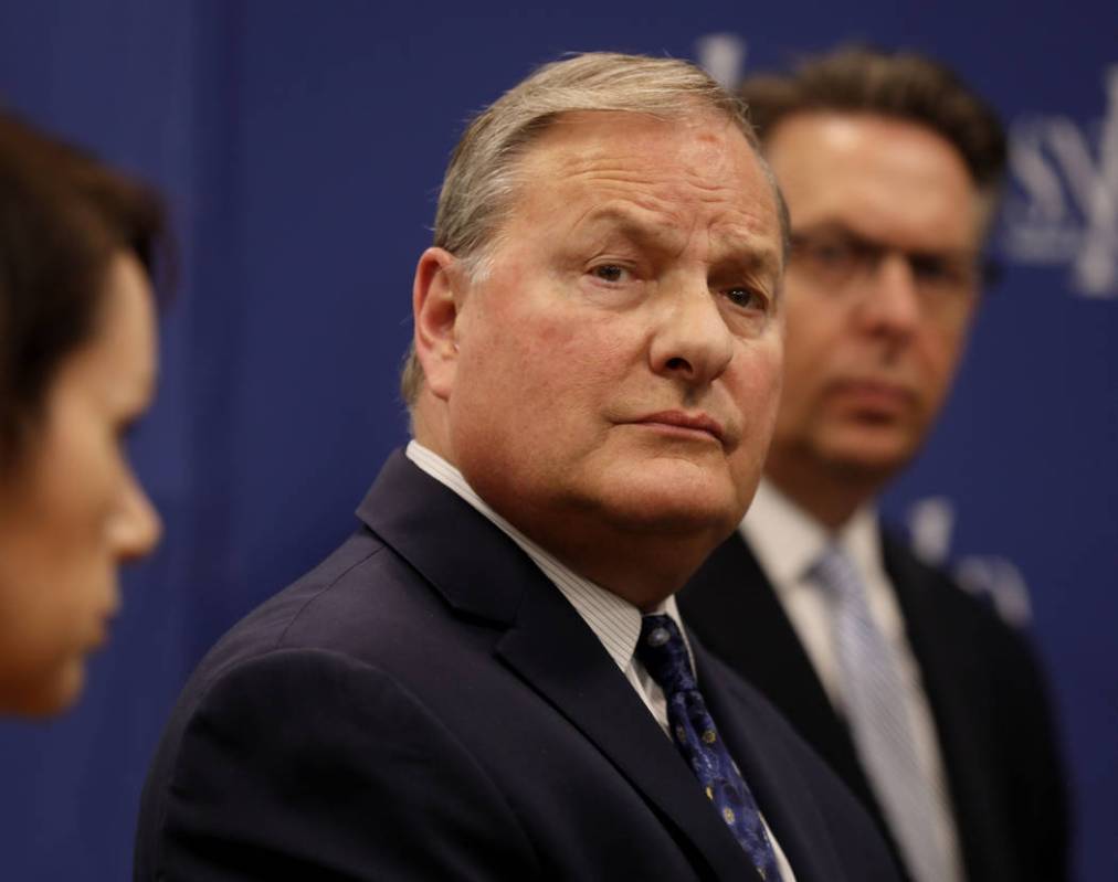 Southern Nevada Health District director of community health Dr. Michael Johnson listens to a q ...