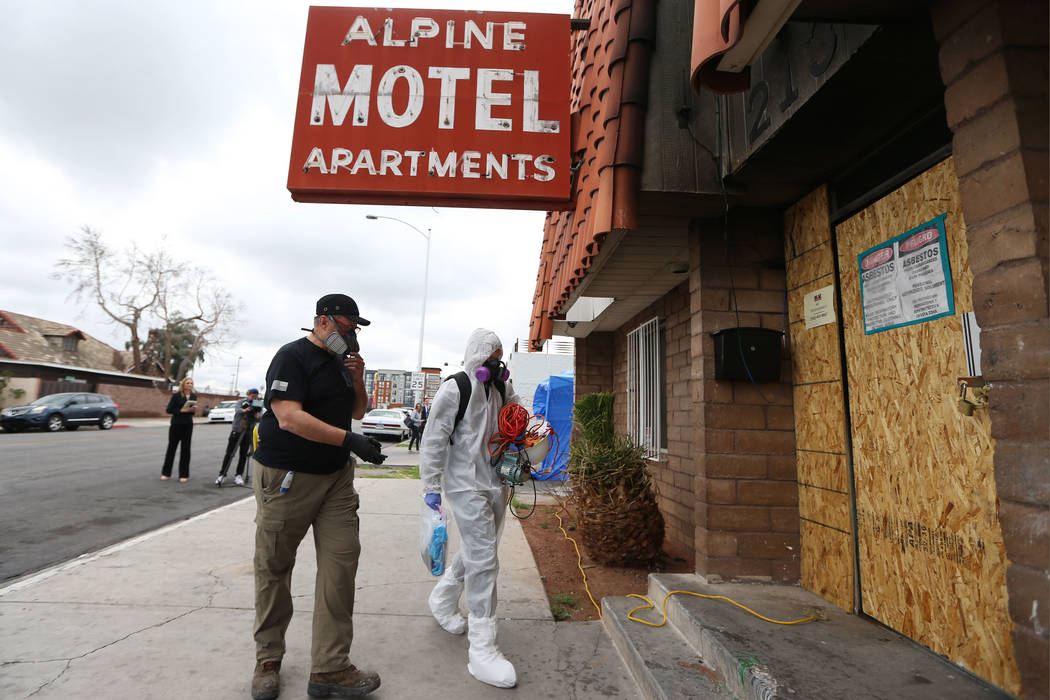 Glenn Gassenberger, left, evidence technician and fire investigation technician with Forensic I ...