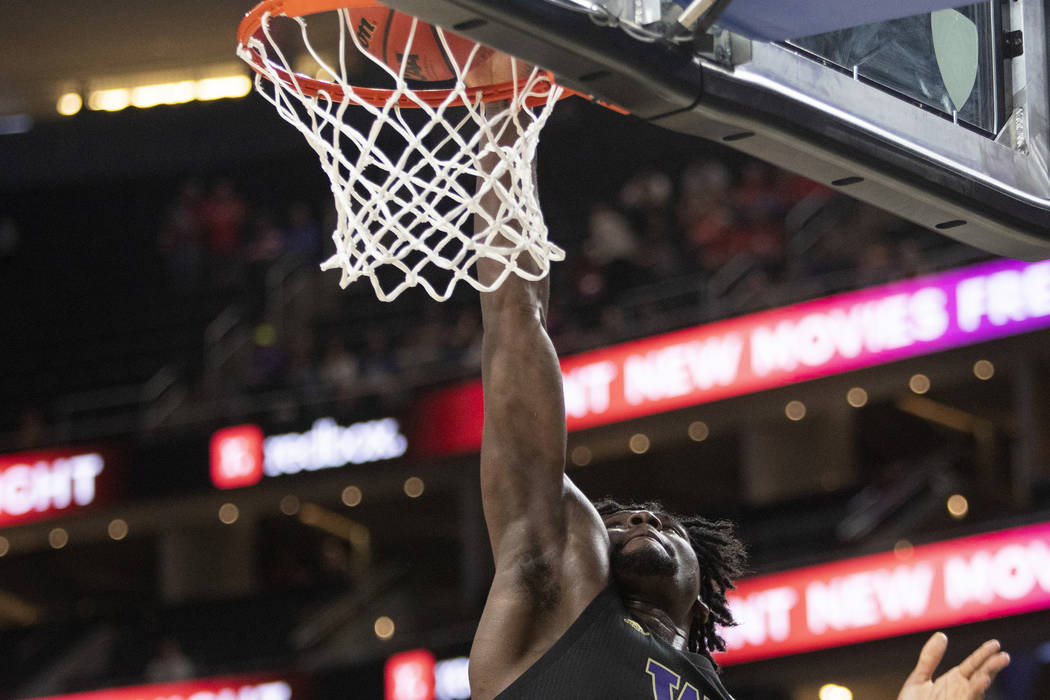 University of Washington's forward Isaiah Stewart (33) shoots a point against Arizona during th ...