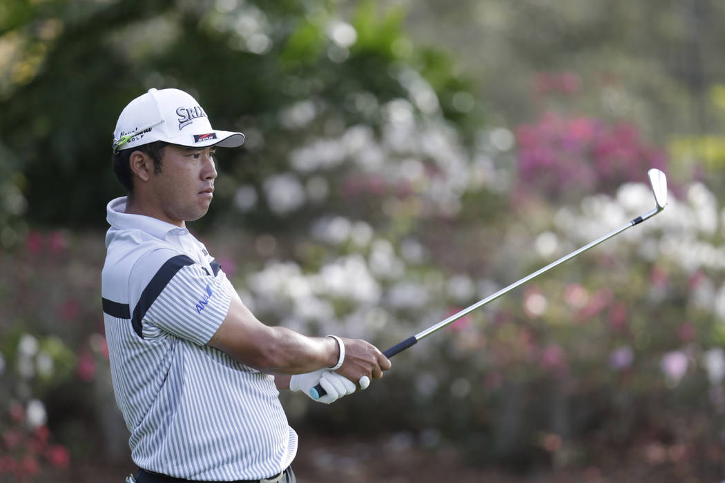 Hideki Matsuyama of Japan, follows his shot from the 13th tee, during the first round of The Pl ...