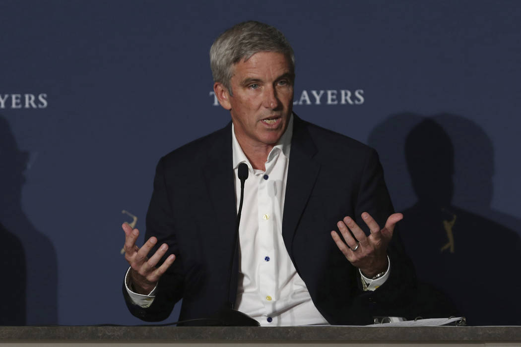 PGA Tour Commissioner Jay Monahan speaks at a news conference at the The Players Championship g ...