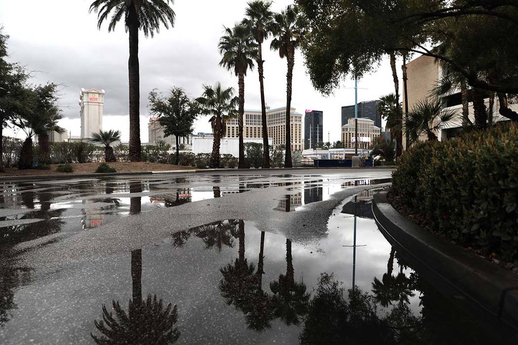 The Las Vegas strip an overnight rain on Friday, March 13, 2020. (Elizabeth Page Brumley/Las Ve ...