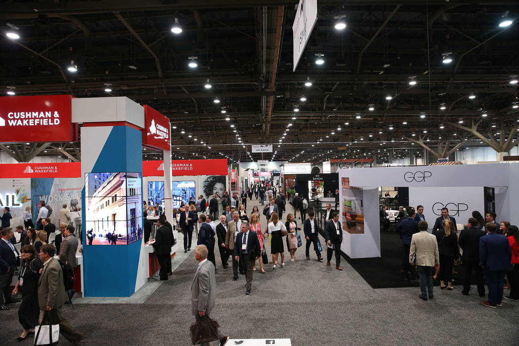 People attend RECon expo at the Las Vegas Convention Center in Las Vegas, Tuesday, May 22, 2018 ...