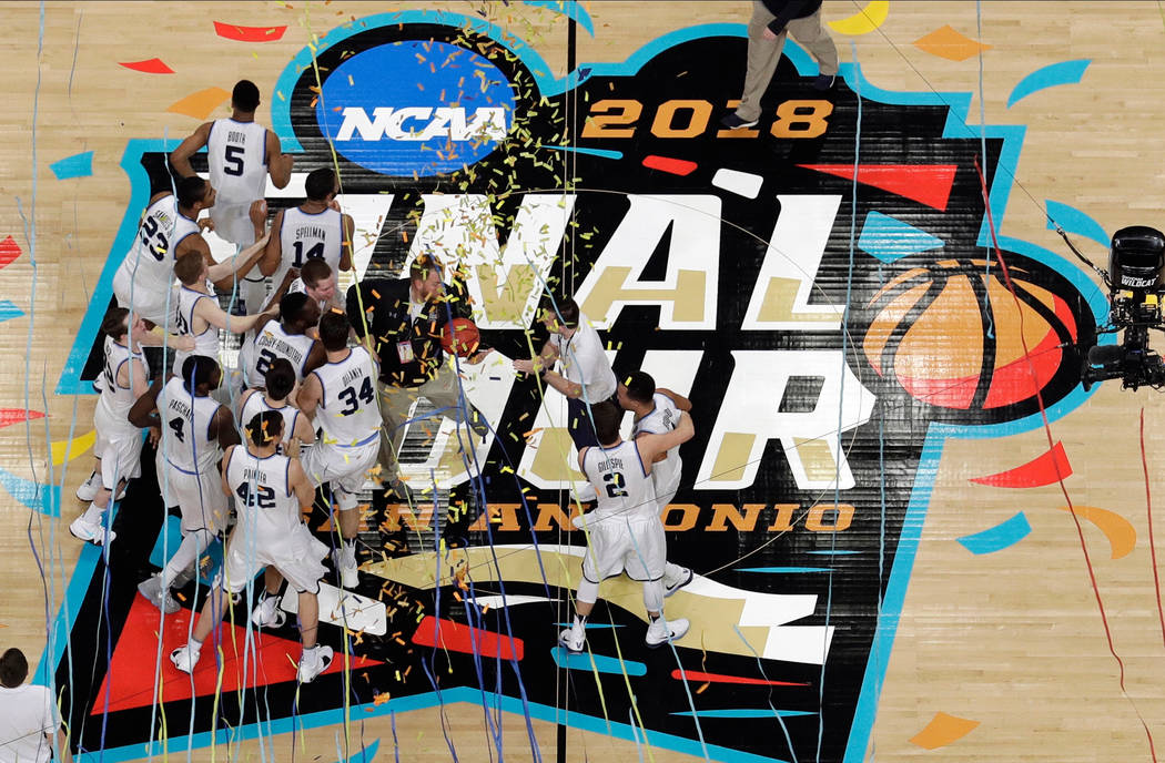 Villanova players celebrate after the championship game of the Final Four NCAA college basketba ...