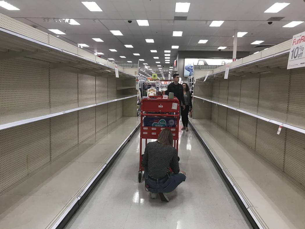 Empty shelves are seen at Target off Flamingo Road and Hualapai Way in Las Vegas, Friday, March ...