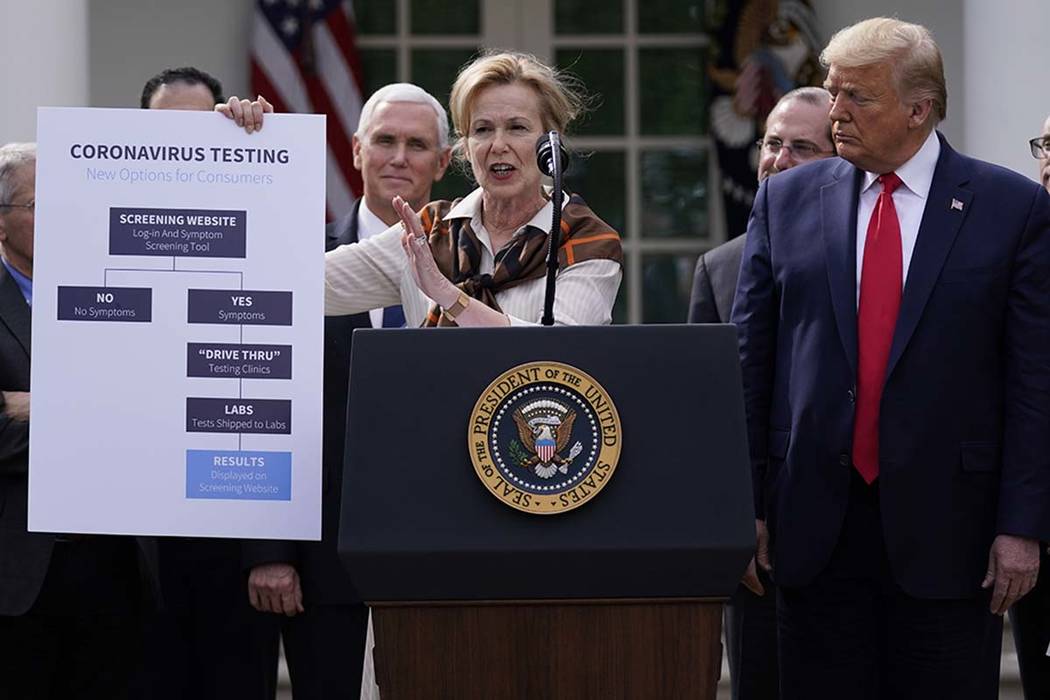 President Donald Trump, right, listens as Dr. Deborah Birx, White House coronavirus response co ...