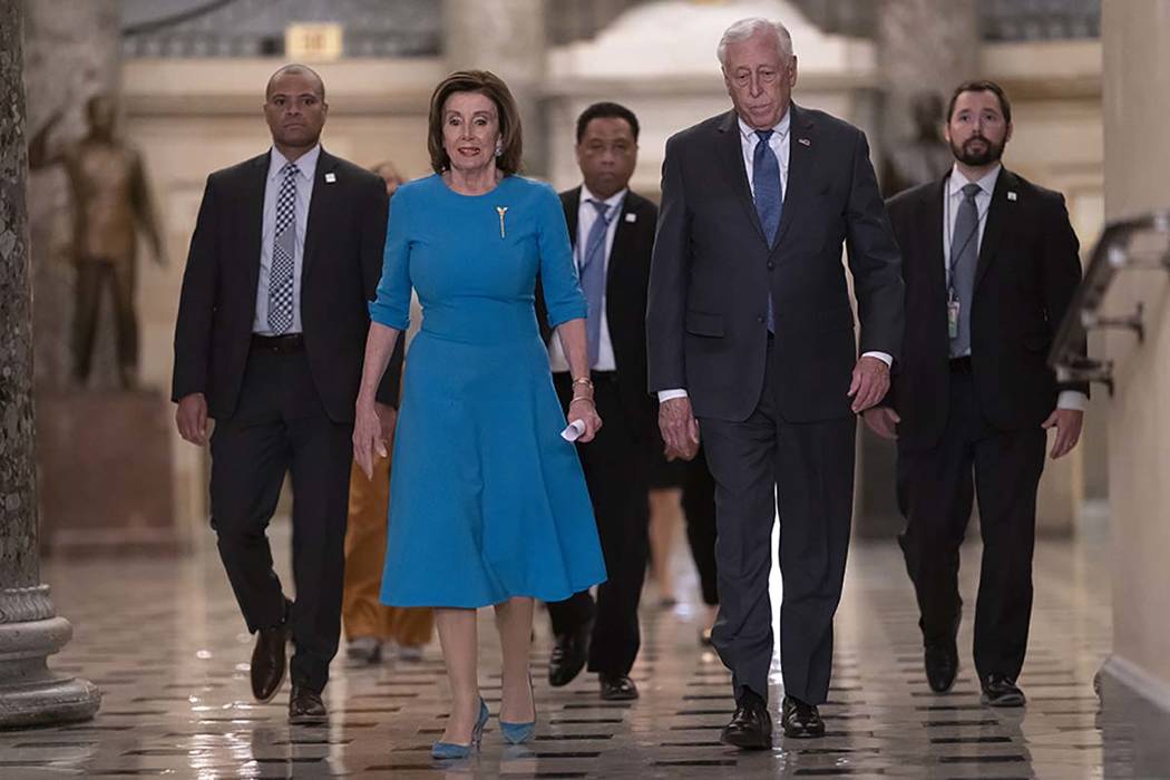 Speaker of the House Nancy Pelosi, D-Calif., and Majority Leader Steny Hoyer, D-Md., arrive to ...