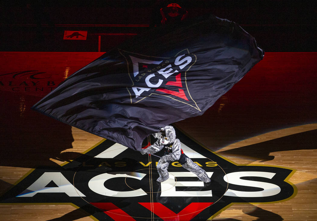 Buckets waves the flag as the Las Vegas Aces ready to face the Washington Mystics during the fi ...