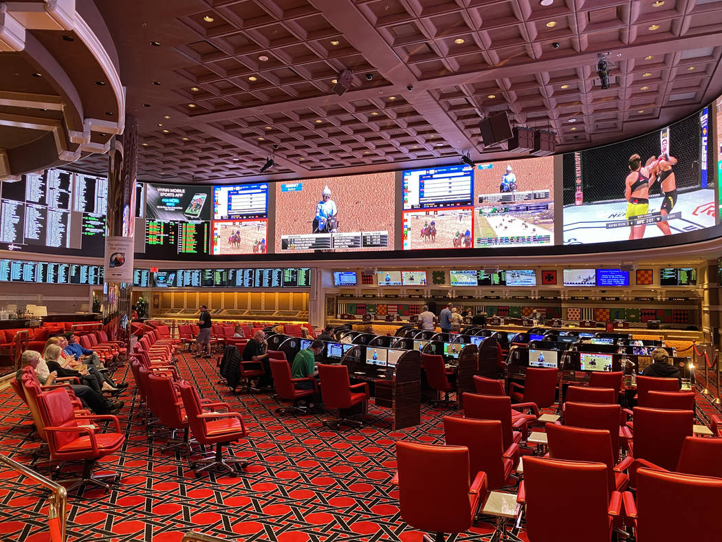 The Wynn Las Vegas sports book is largely empty on Saturday, March 14, 2020, in Las Vegas. (Ben ...