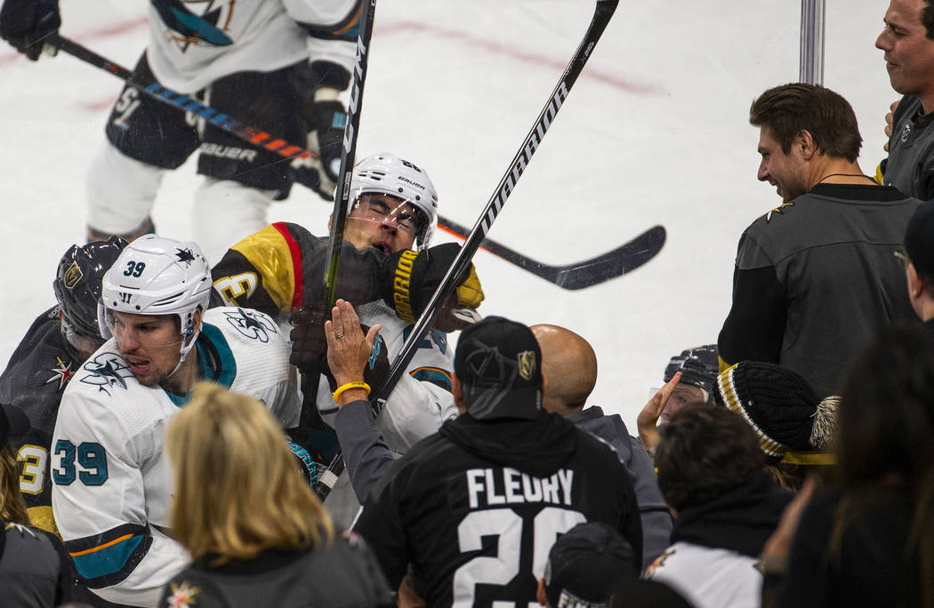 San Jose Sharks right wing Timo Meier (28, right) is punched in the face by Vegas Golden Knight ...