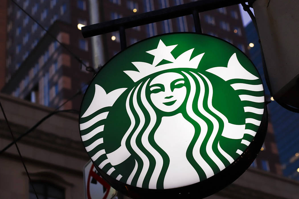 A Starbucks sign outside a Starbucks coffee shop in downtown Pittsburgh. (AP Photo/Gene J. Puskar)