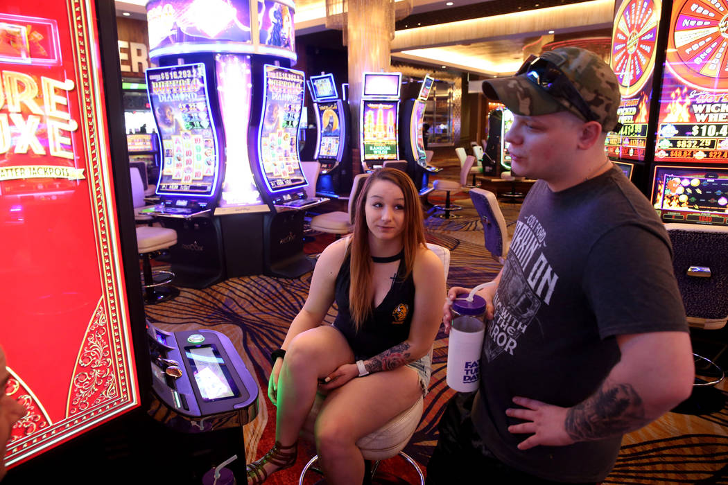 Sarah Schiltz, 21, and Chase Hubbell, 23, both of Fargo, N.D. talk to a reporter at Sahara Las ...