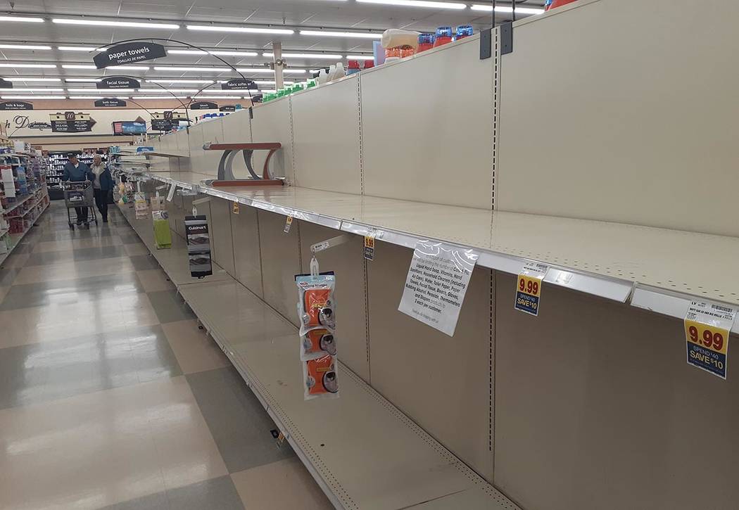 Empty store shelves on Sunday, March 15, 2020, at Smith's Food & Drug at Eastern Avenue and Win ...