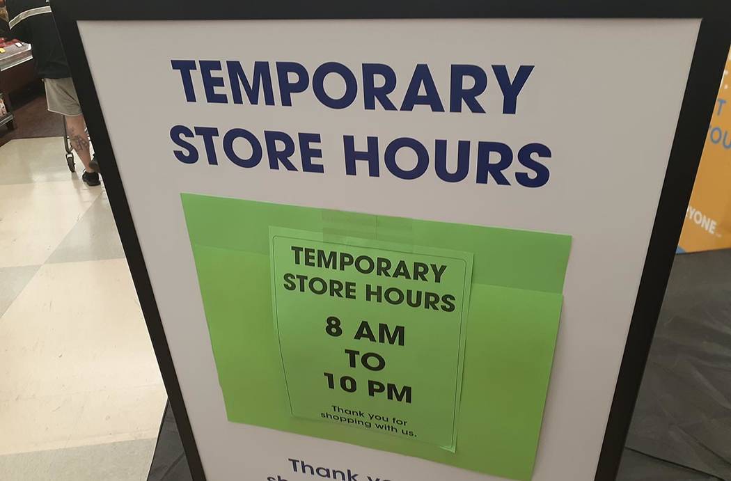 A sign at the Smith's Food & Drug at Eastern Avenue and Windmill advises of temporary hours fro ...