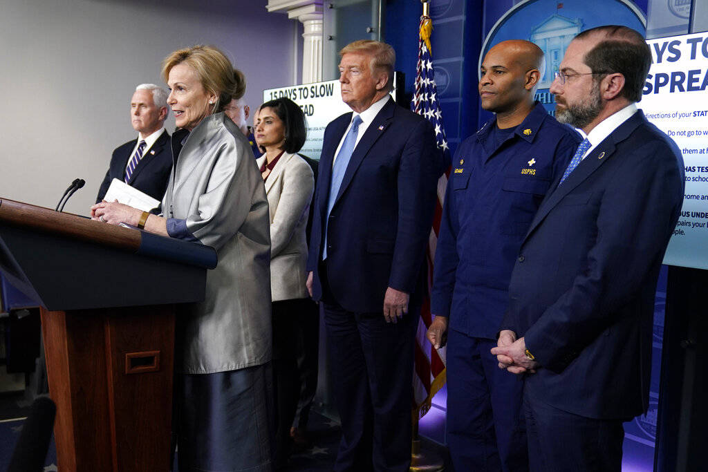 President Donald Trump listens as Dr. Deborah Birx, White House coronavirus response coordinato ...