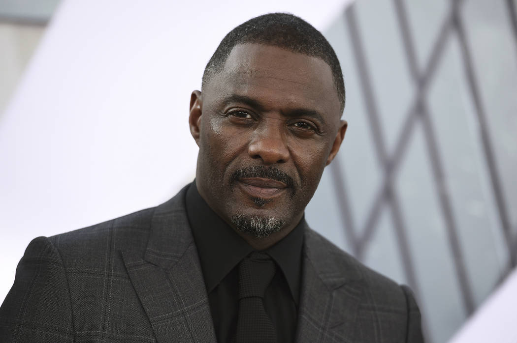 In this July 13, 2019, file photo, Idris Elba arrives at the Los Angeles premiere of "Fast & Fu ...