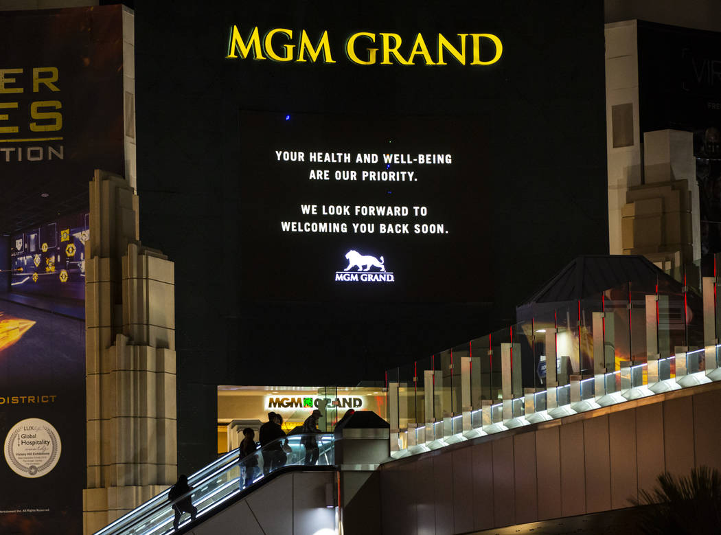 Signage indicates the temporary closure of the MGM Grand in Las Vegas on Monday, March 16, 2020 ...