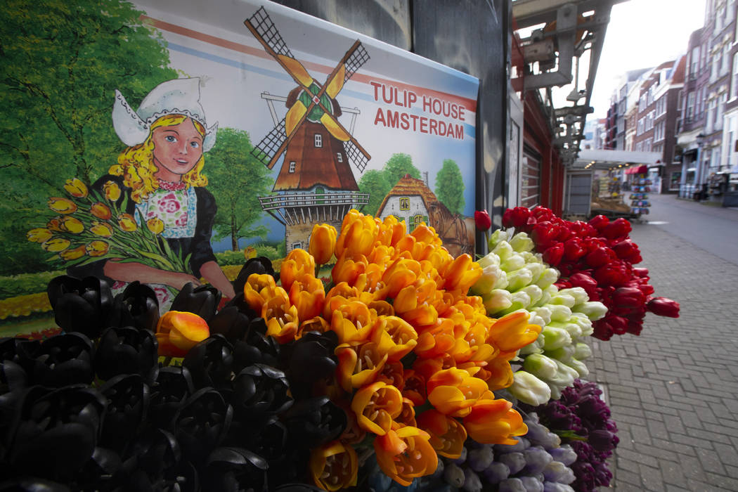 The deserted flower market, normally bustling with tourists, is seen in Amsterdam, Netherlands, ...