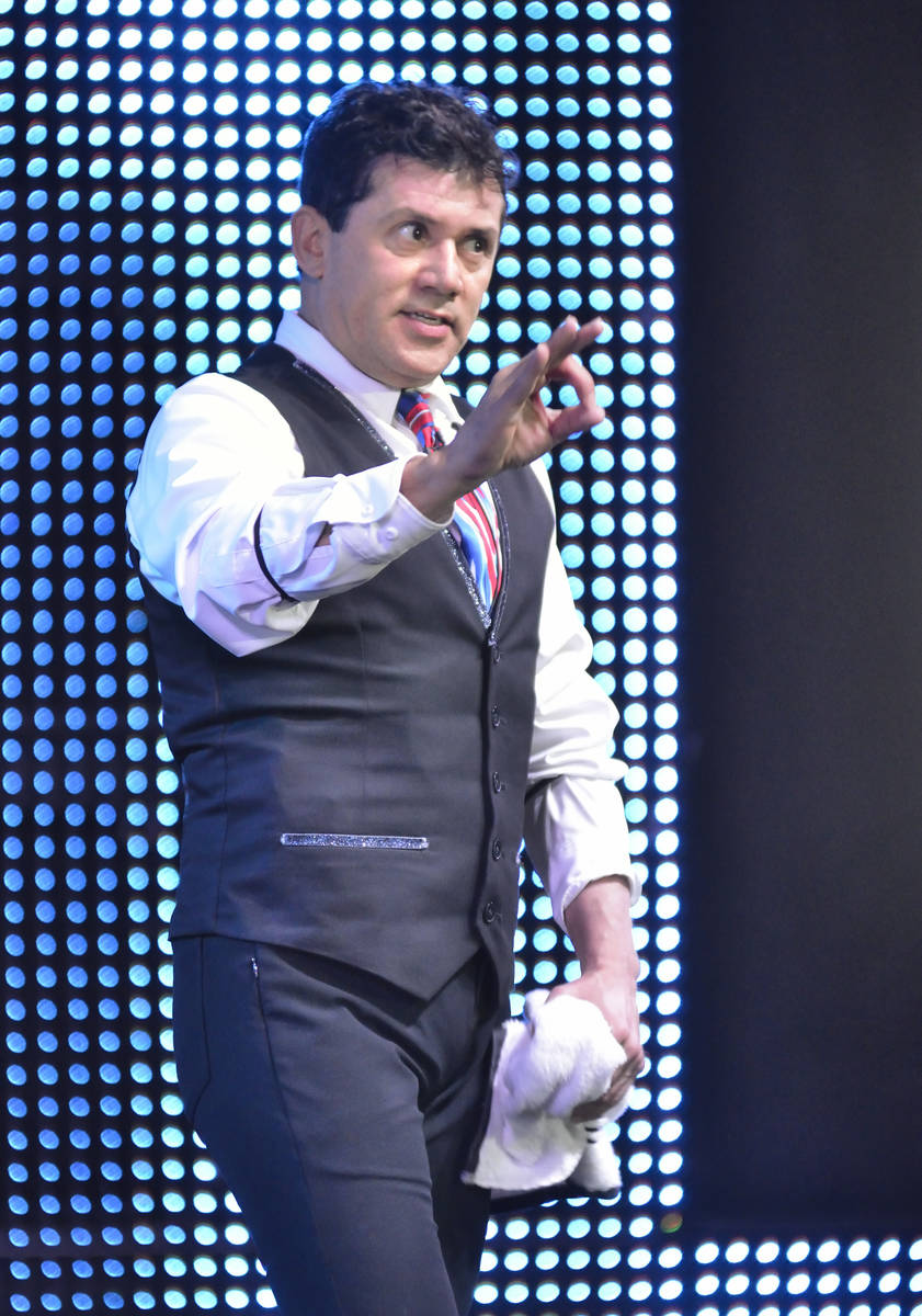 Juggler and emcee Wally Eastwood performs during "V - The Ultimate Variety Show" at t ...