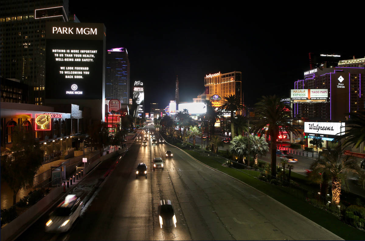 Well wishes are offered on a sign by the Park MGM staff along Las Vegas Blvd. as nonessential b ...