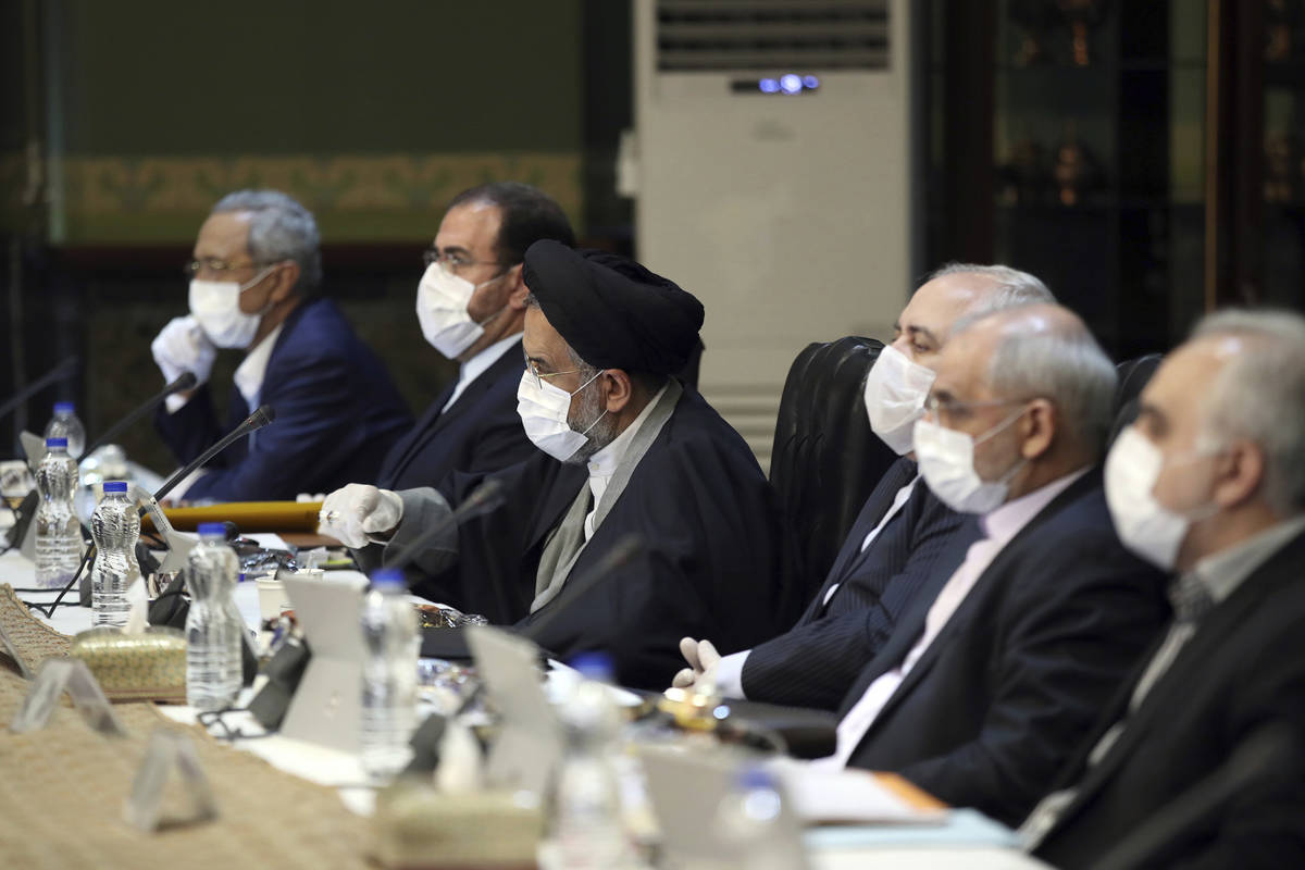 In this photo released by the official website of the Office of the Iranian Presidency, cabinet ...