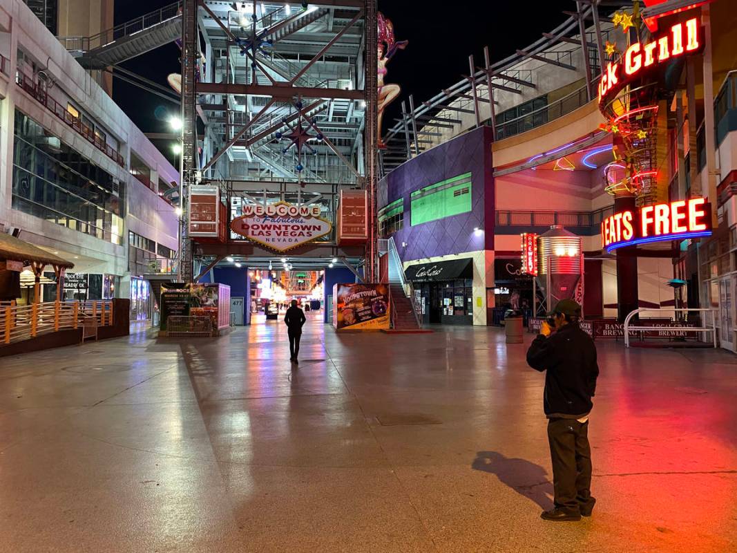 The welcome sign dark at Fremont Street Experience in downtown Las Vegas Wednesday, March 18, 2 ...