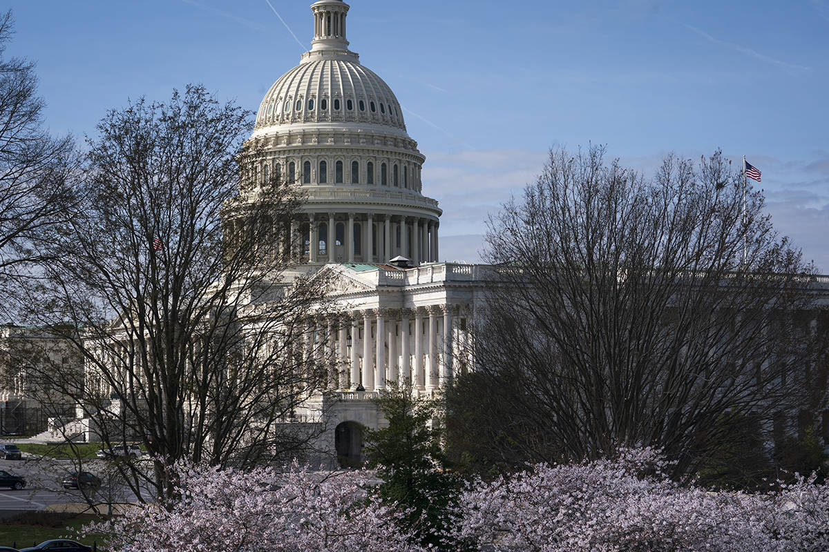 The Capitol is seen as lawmakers negotiate on the emergency coronavirus response legislation, a ...