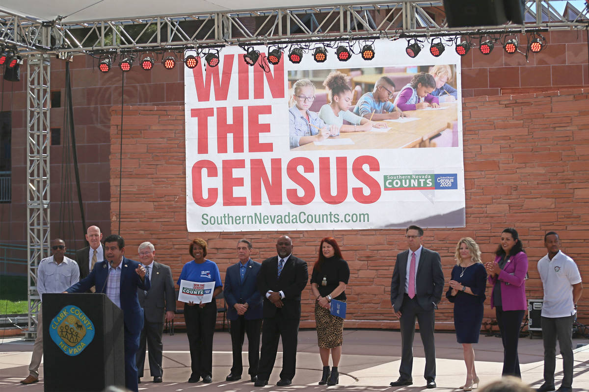 Government official, including North Las Vegas Councilman Isaac Barron, participate during the ...