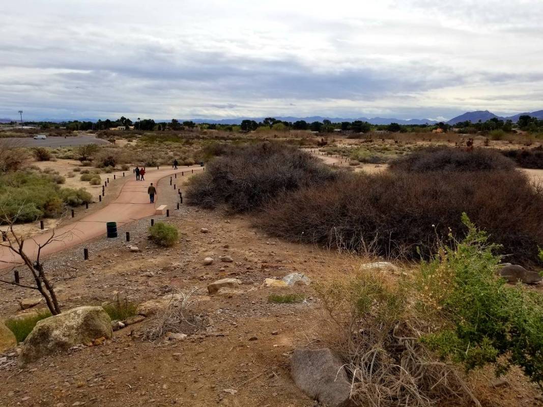 Walkers and runners keeping their social distances while getting fresh air Wednesday at Dunes D ...
