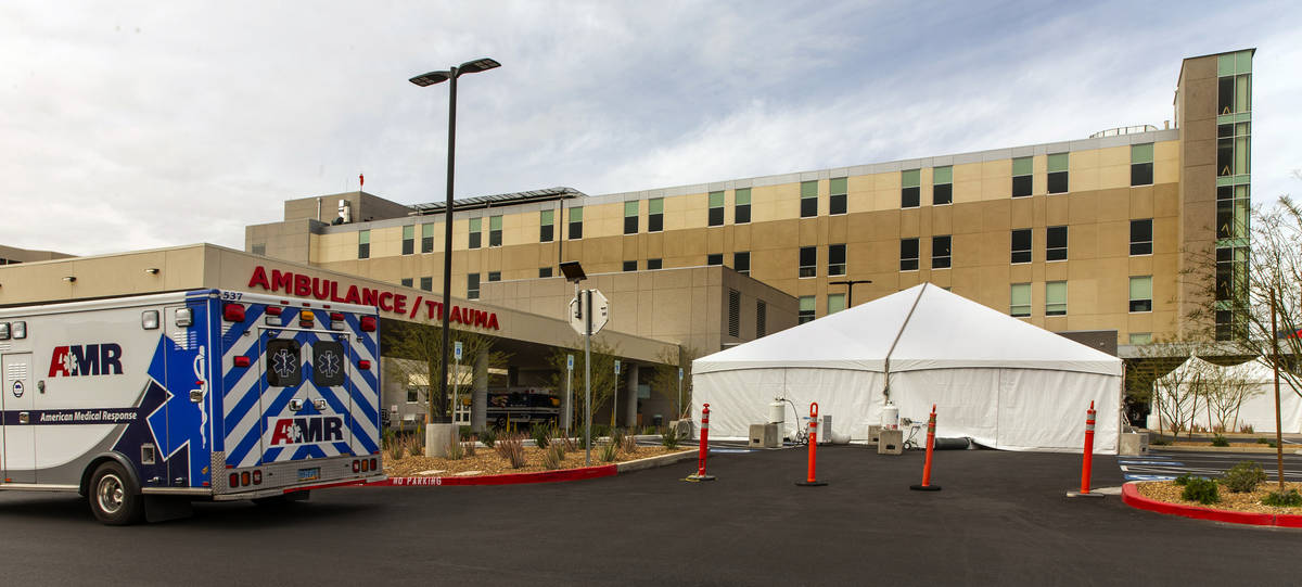 Sunrise Hospital and Medical Center has erected tents, currently empty, in their parking lot ne ...