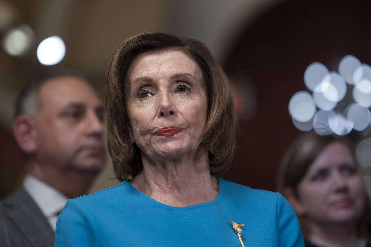 Speaker of the House Nancy Pelosi, D-Calif., pauses as she makes a statement ahead of a planned ...