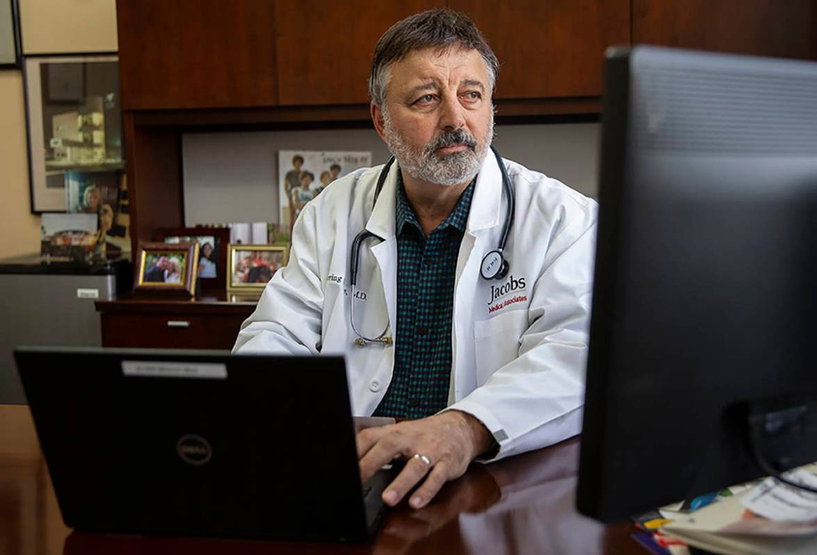 Primary care physician Dr. Loring Jacobs at his office in Henderson on Friday, March 20, 2020. ...