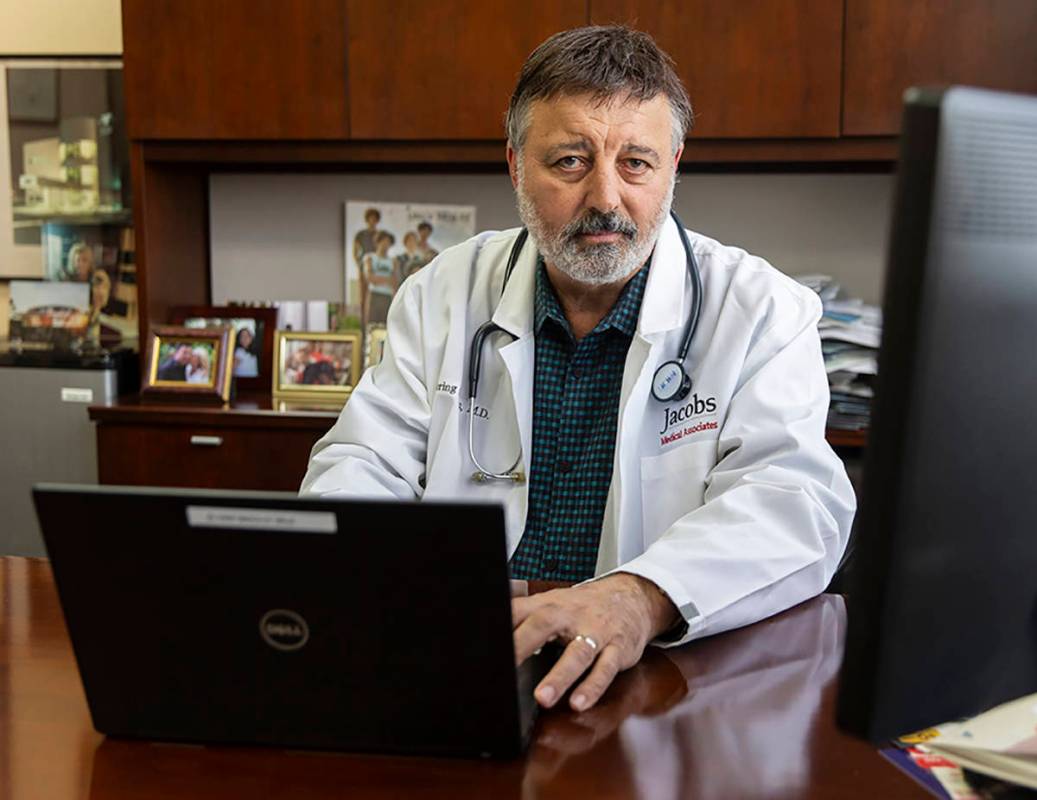 Primary care physician Dr. Loring Jacobs at his office in Henderson on Friday, March 20, 2020. ...