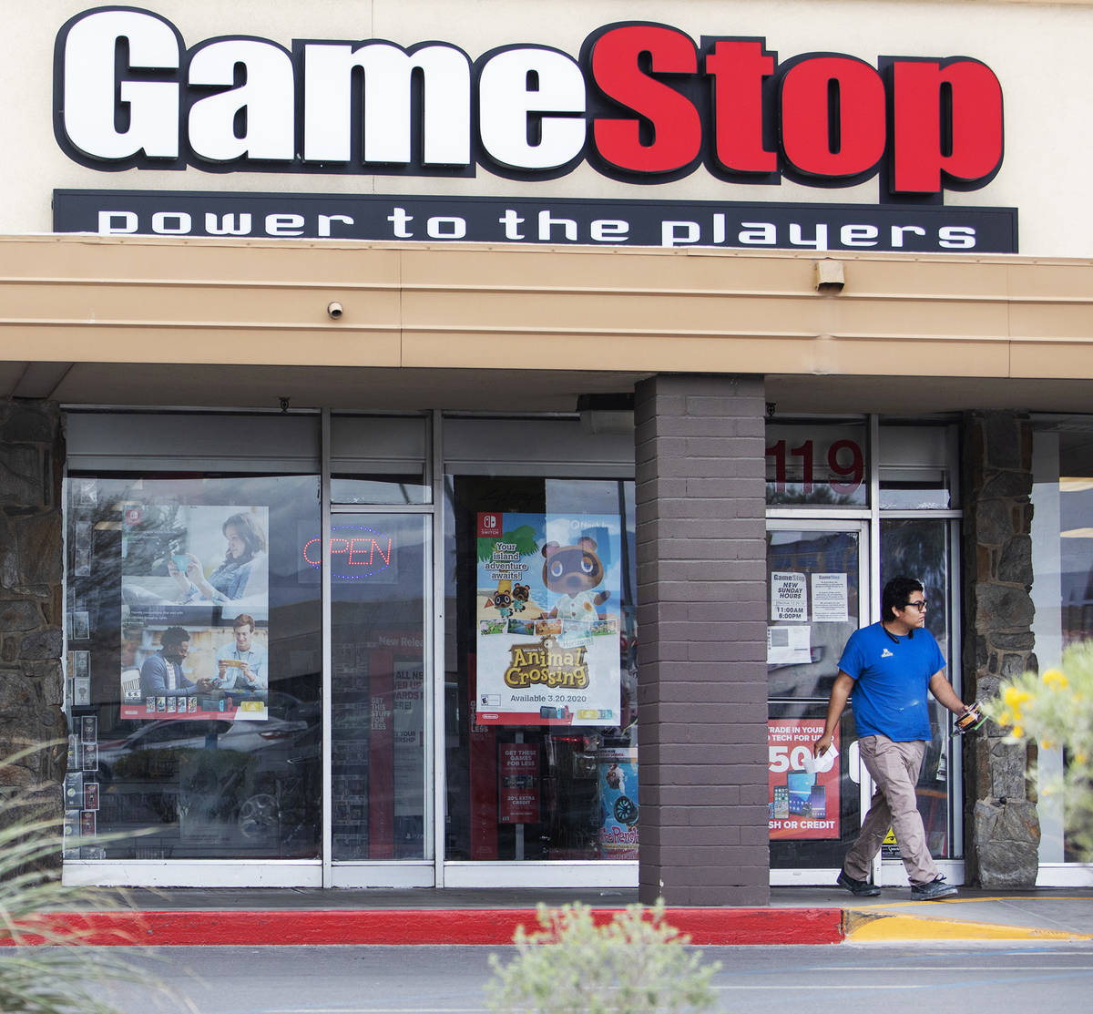 The GameStop store at 2119 East Lake Mead Boulevard remains open despite a call for nonessentia ...