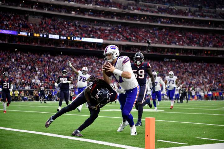 FILE - In this Jan. 4, 2020, file photo, Buffalo Bills quarterback Josh Allen (17) catches a pa ...