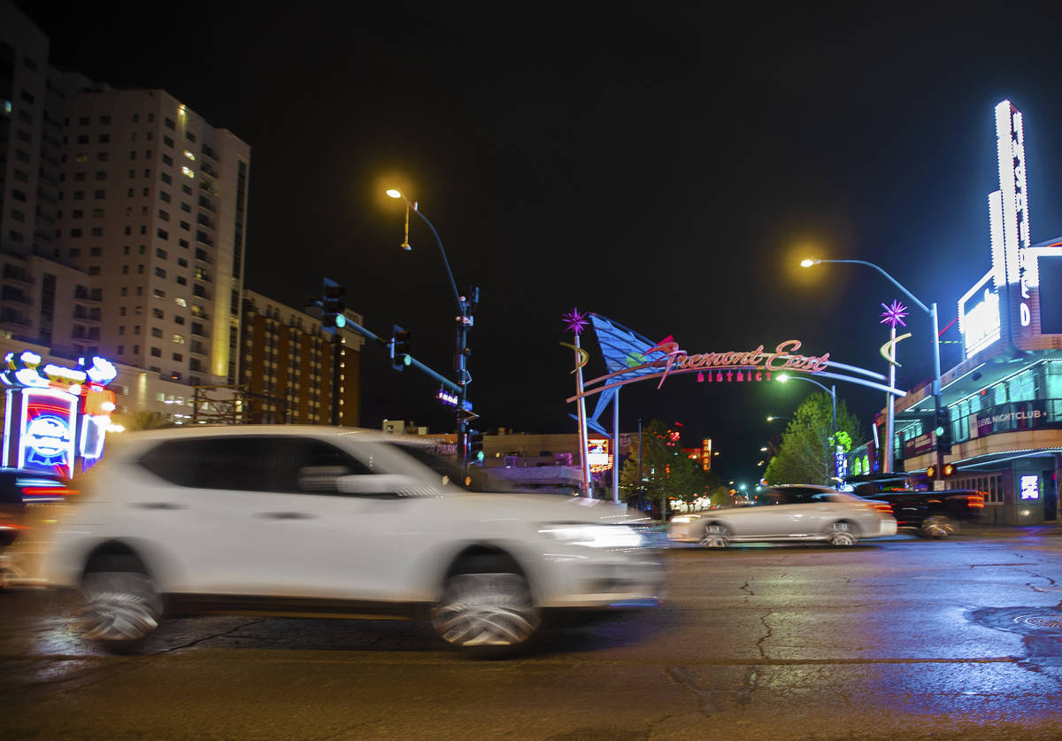 Light traffic passes through downtown Las Vegas near the Fremont Street Experience on Thursday, ...