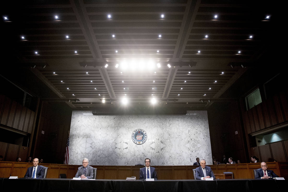 From left, Labor Secretary Eugene Scalia, Senate Majority Leader Mitch McConnell of Ky., Treasu ...