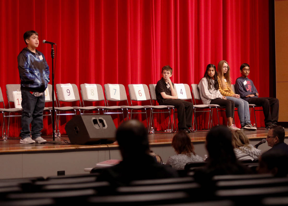 At the microphone, 10-year-old Odessa Christian student Joseph Davis advances onto the 10th rou ...