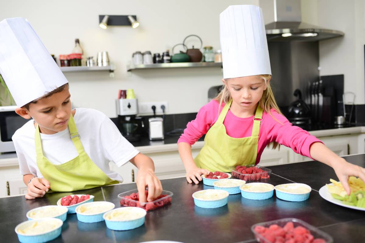 Families can cook together during this stay-at-home time. (Getty Images)