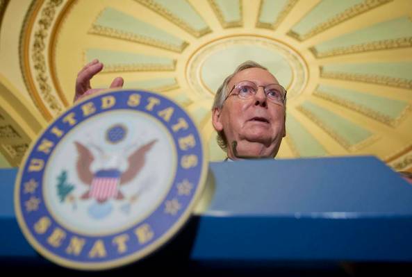 Senate Majority Leader Mitch McConnell of Ky. speaks during a news conference on Capitol Hill i ...