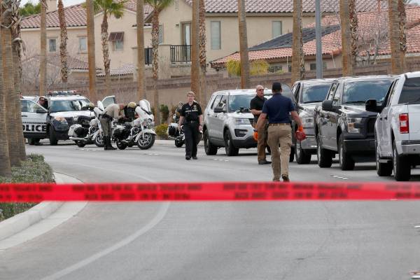 Police investigate a fatal motorcycle accident near the intersection of Tenaya Way and Robindal ...