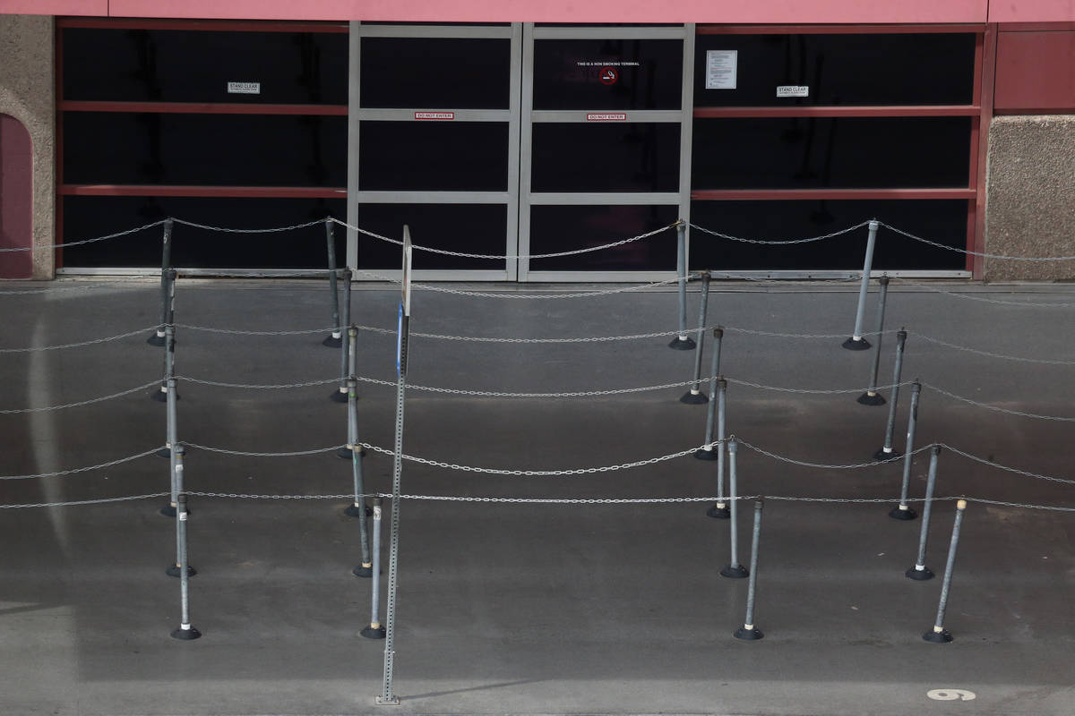 An empty taxi line at McCarran International Airport in Las Vegas, Thursday, March 19, 2020. (E ...