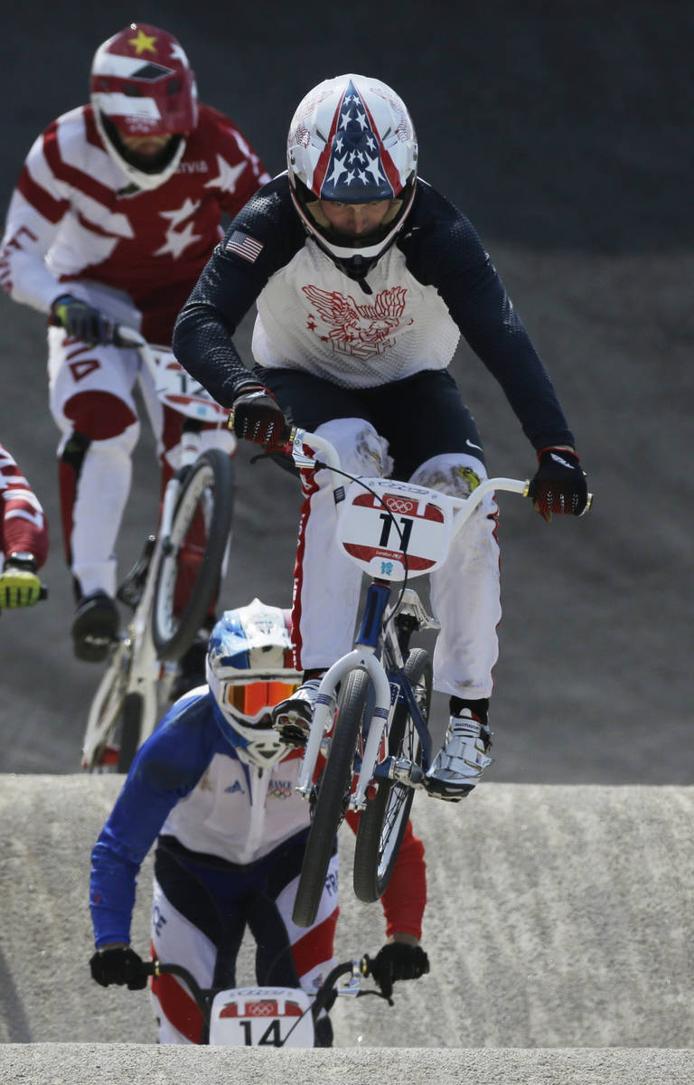 United States' Connor Fields (11) competes in a BMX cycling men's semifinal run during the 201 ...